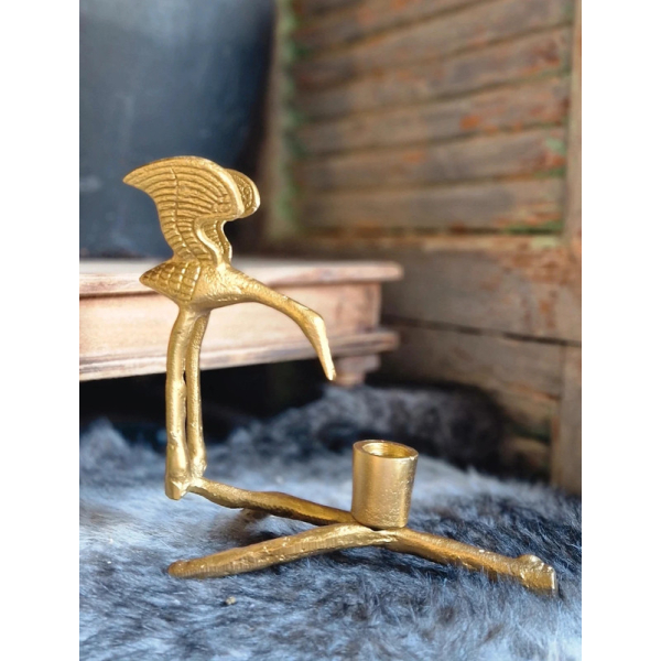 Goudkleurige kandelaar vogel 