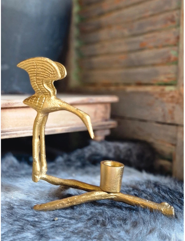 Goudkleurige kandelaar vogel 