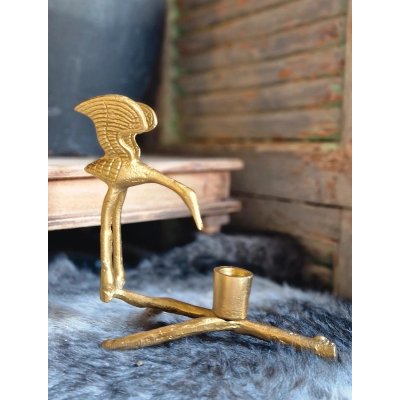 Goudkleurige kandelaar vogel 